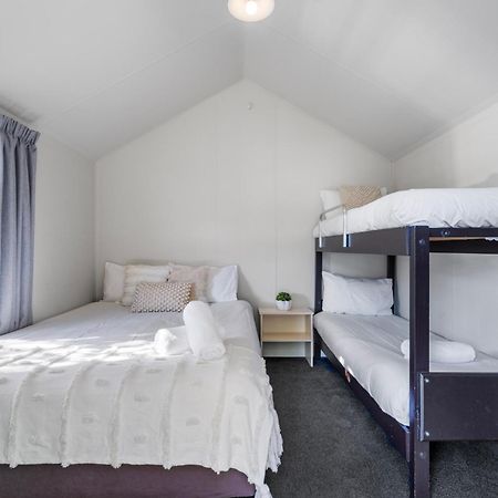 Tasman Holiday Parks Picton Exterior photo A bunk bed in a bedroom